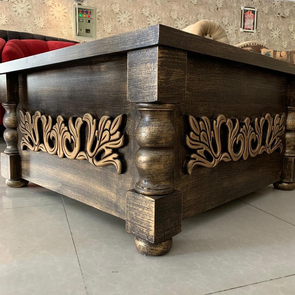 Wood crafted table with chalk finishing